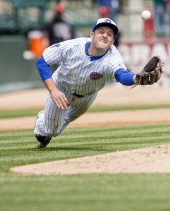 South Bend Cub's third baseman Jason Vosler (21) reaches for a pop fly near the pitchers mound during Thursday's game against the Lansing Lugnuts May 14, 2015 in South Bend. 